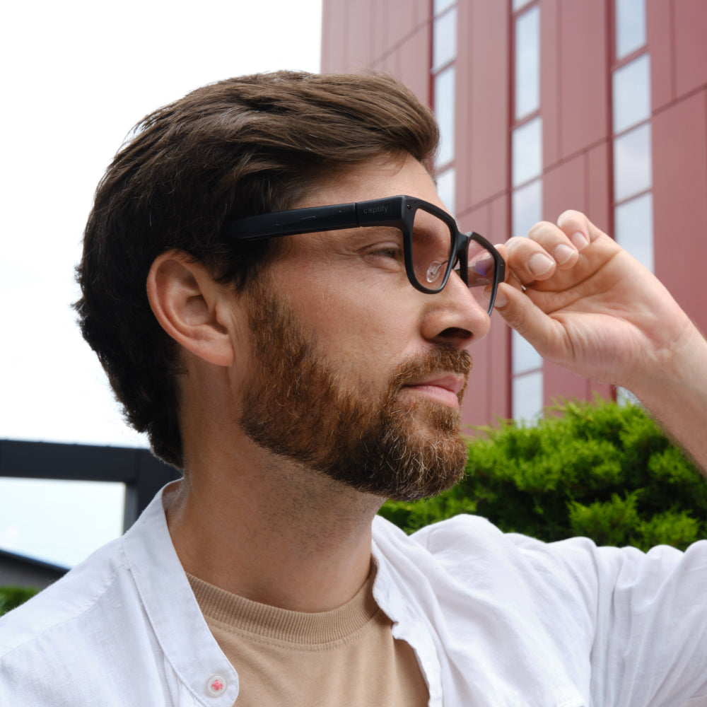 What assistive augmented reality eyewear can help me follow conversations better?